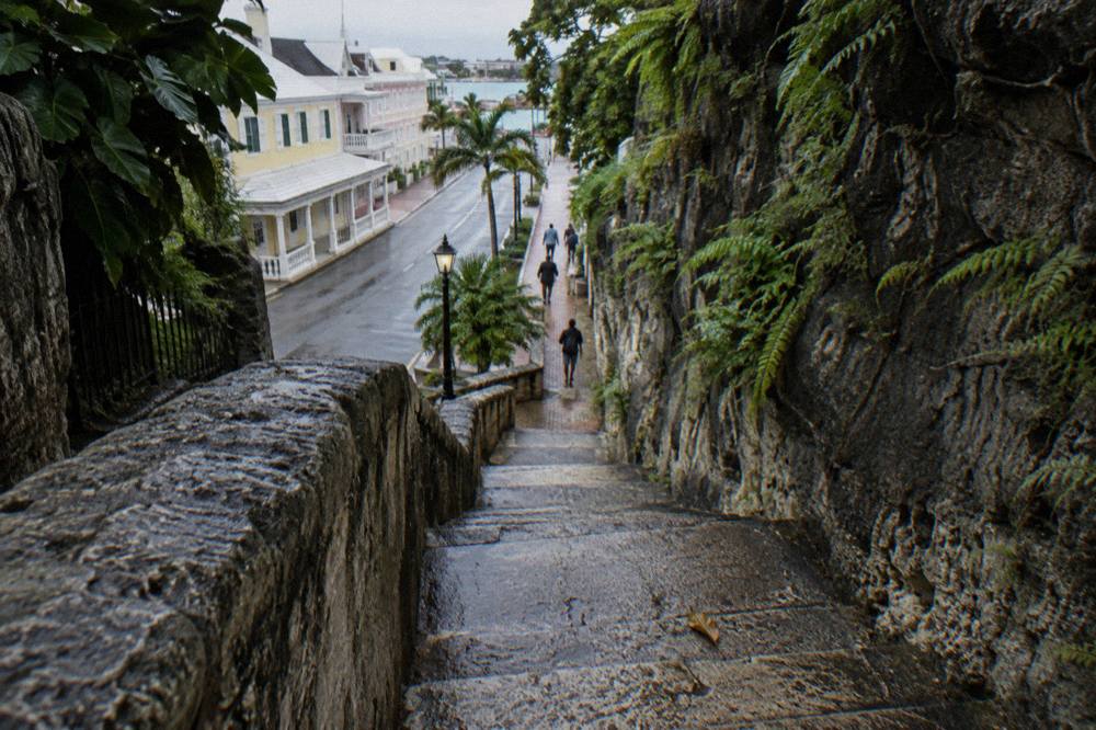 Sixty-five limestone steps of the Queen's Staircase winding between rock walls